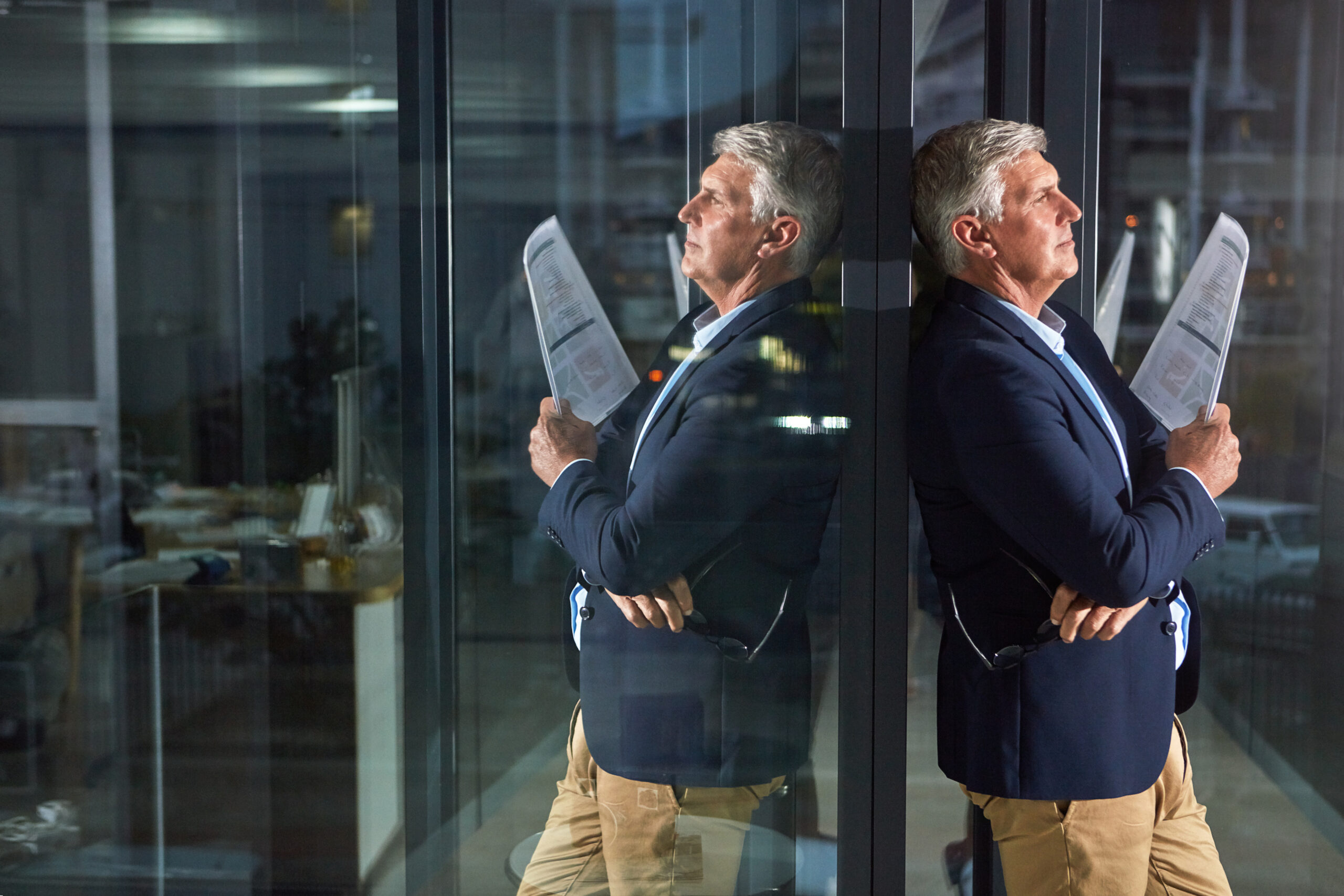 documents-planning-thinking-with-business-man-financial-workplace-decision-night-dark-paperwork-reflection-with-mature-finance-employee-glass-office-investment-management